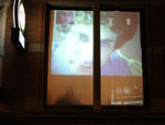 Street view with projection of Jonathan and Joseph